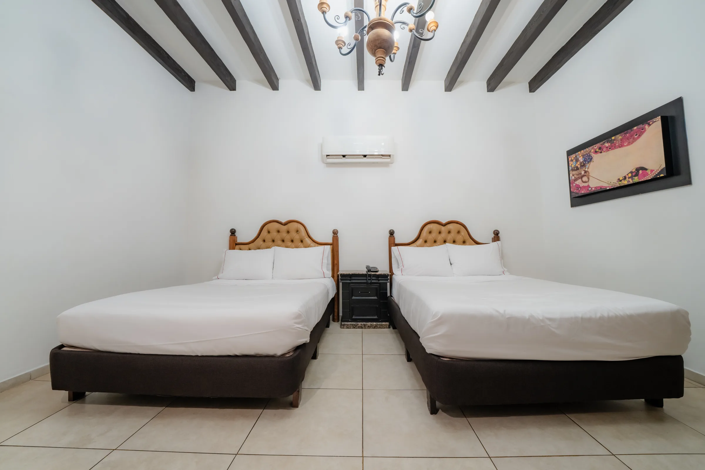 Habitación Doble Estándar con dos camas matrimoniales